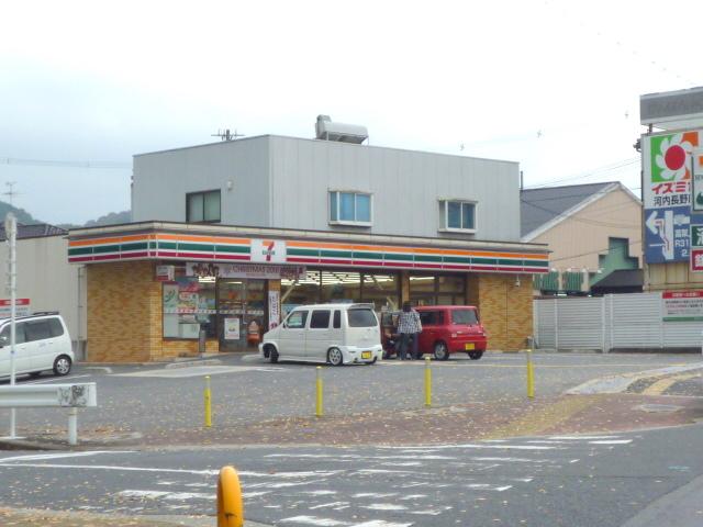 スコルピオ清和 コンビ二：セブンイレブン河内長野向野町店　1158m